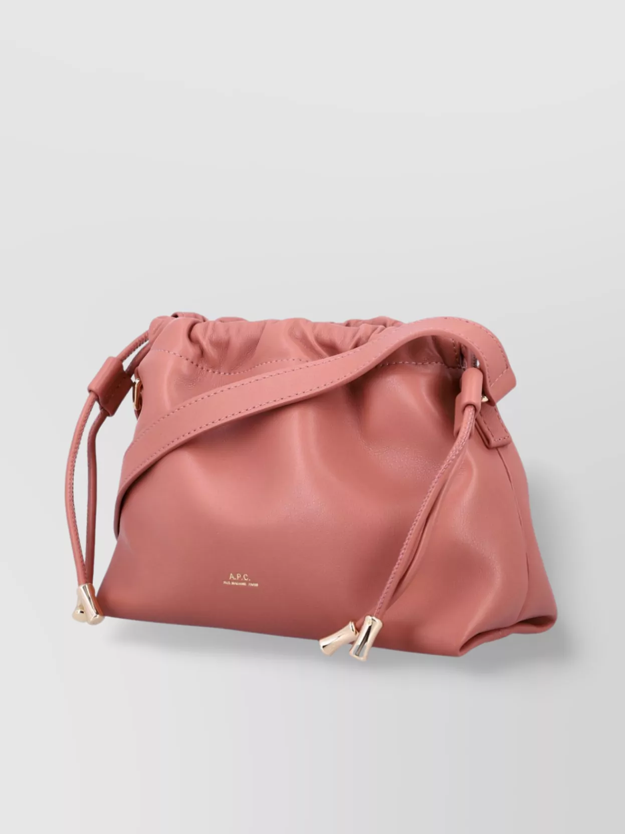 Apc Ninon Mini Pink Crossbody Bag With Embossed Logo On The Front And Adjustable Shoulder Strap In Ecole
