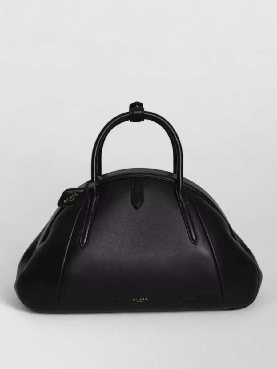 Alaïa leather top handle tote bag