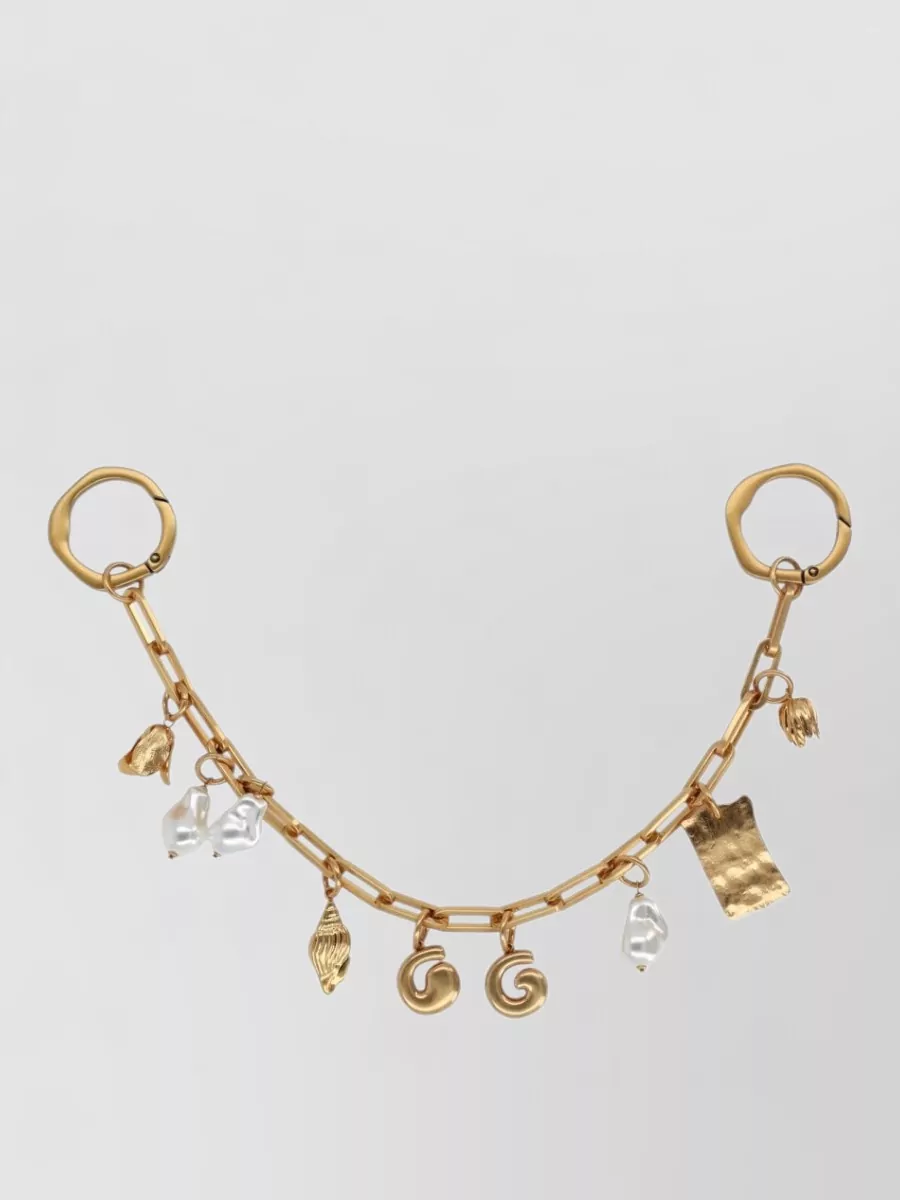 Cult Gaia brass bag charm