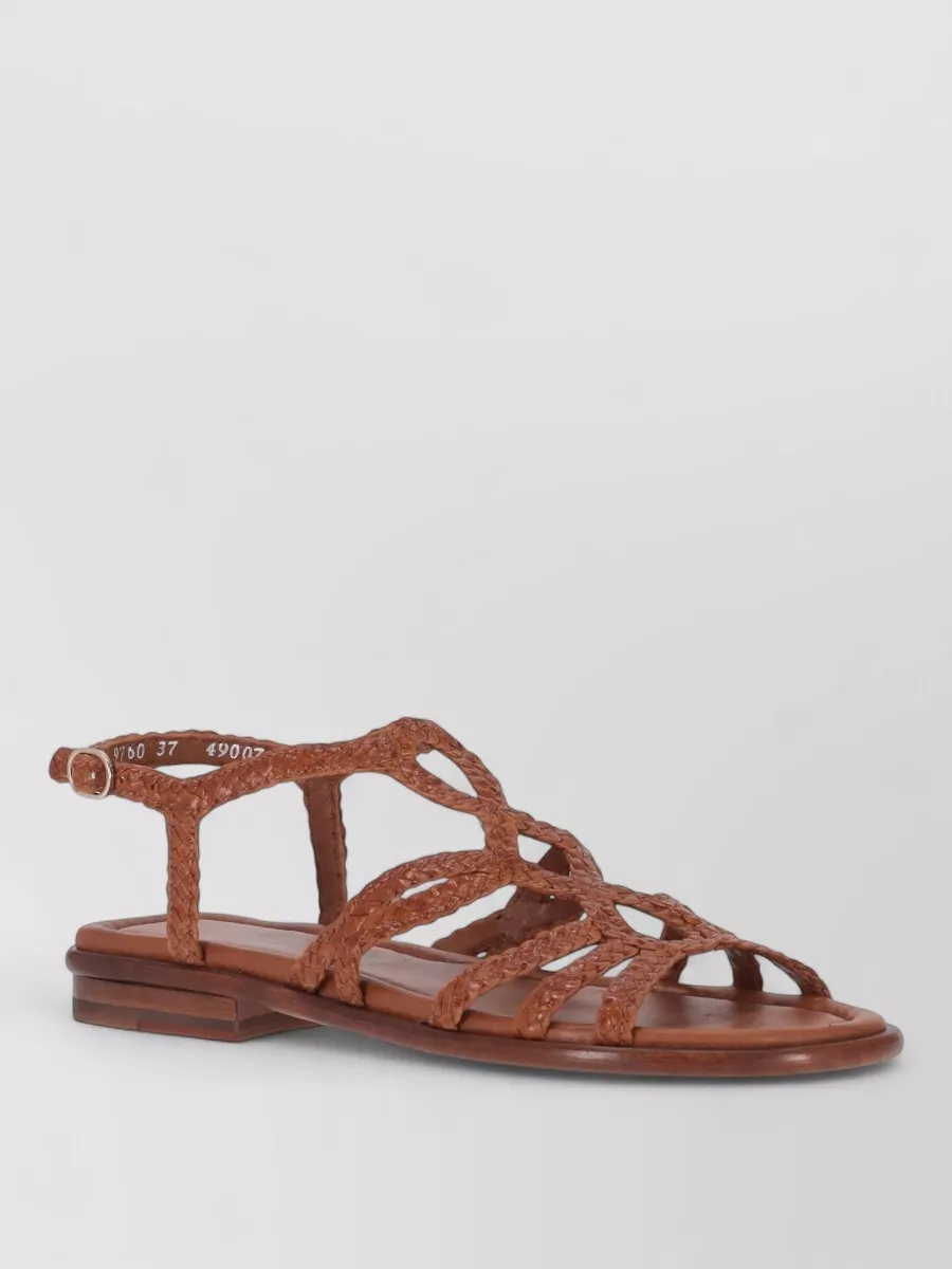La Rose leather woven flat sandals