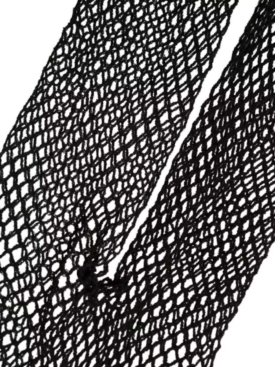 Dolce&Gabbana Fishnet tights — The sheer black fishnet tights add a sultry, downtown layer under the mini hem, giving texture and attitude while keeping the all-black palette intact.