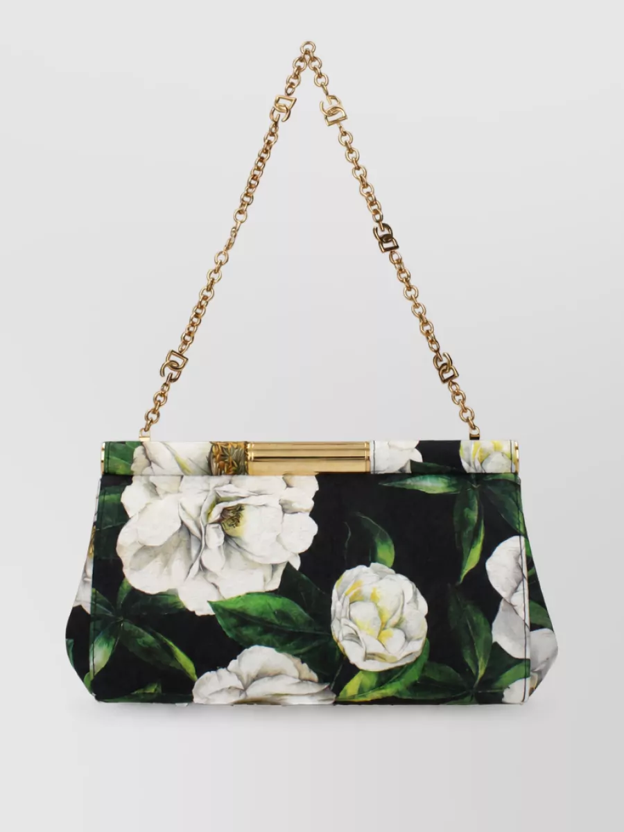 Dolce&Gabbana marlene fabric mini bag — The soft-pink saddle bag matches the blush top and rosy tones in the shorts while its clean, structured shape keeps the overall styling polished rather than saccharine.
