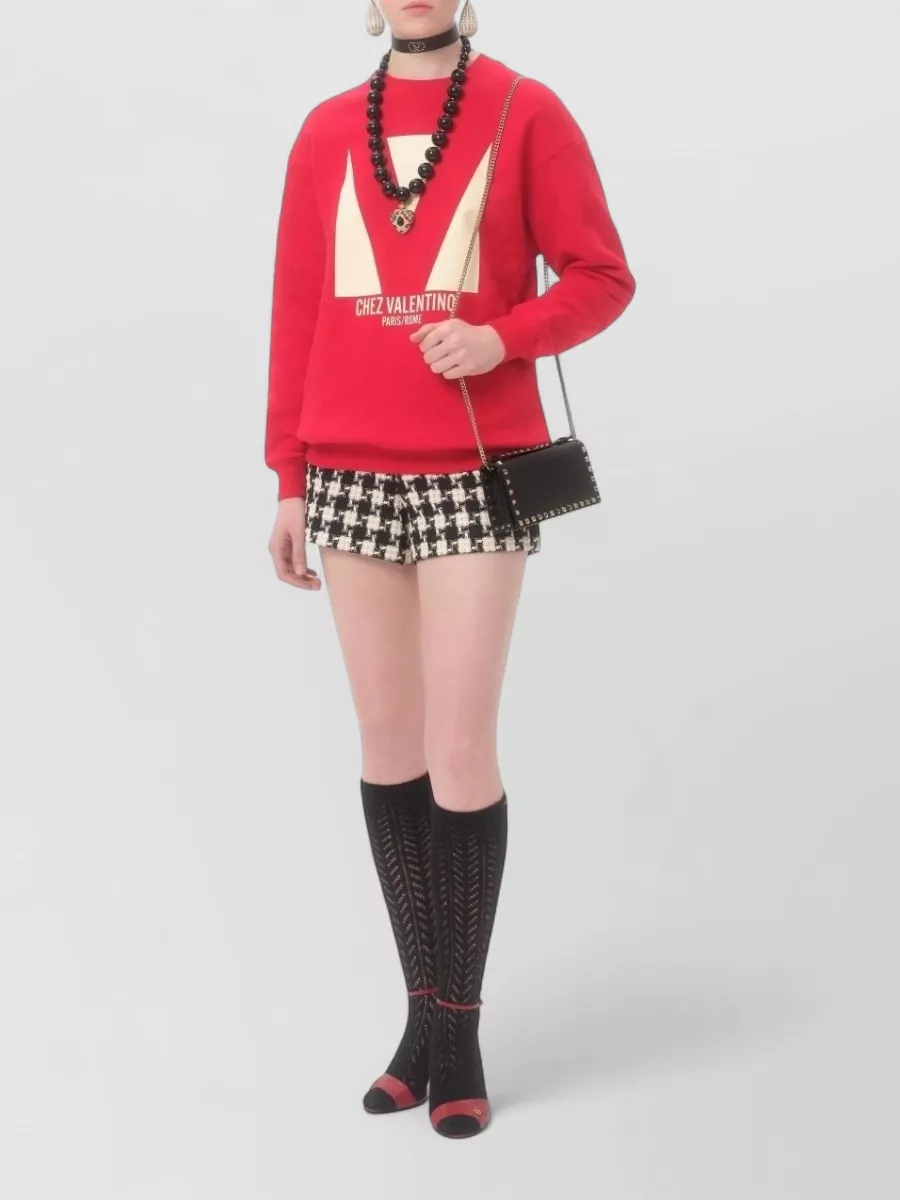 Valentino Chain Wallet Featuring Studded Design