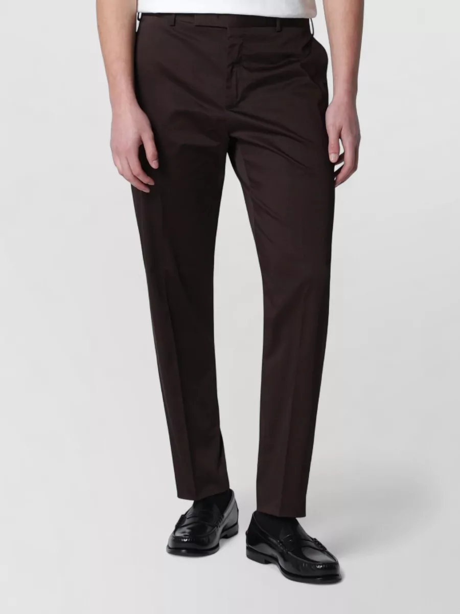 Pt Torino Straight-leg trousers — The Pt Torino dark chocolate straight-leg trouser keeps the palette rich but soft against the black cardigan, matching its quiet luxury mood and smart-casual formality while working for warm seasons.