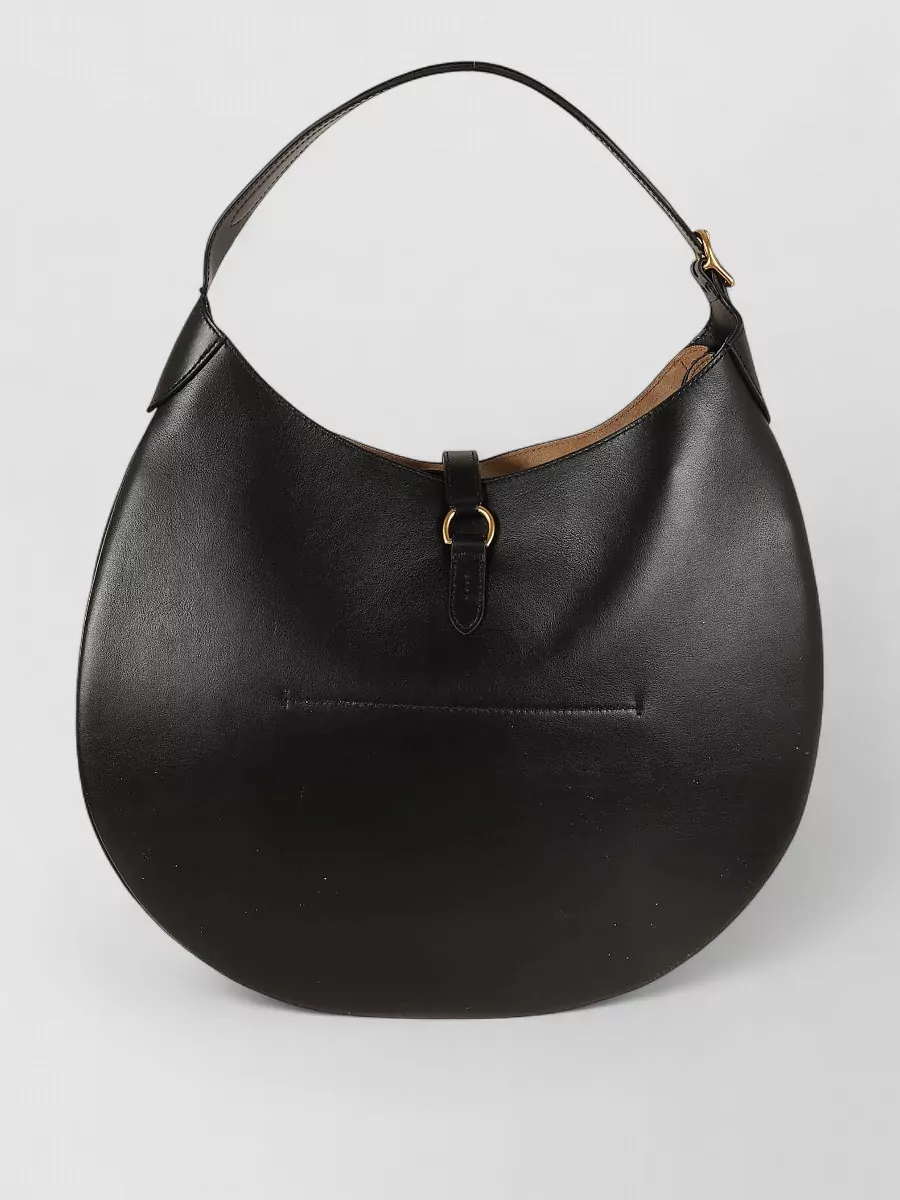 Polo Ralph Lauren Leather shoulder bag — The black Polo Ralph Lauren hobo in smooth leather mirrors the loafer’s refinement and completes a coherent, minimal palette of espresso, navy, and black with subtle tan warmth.