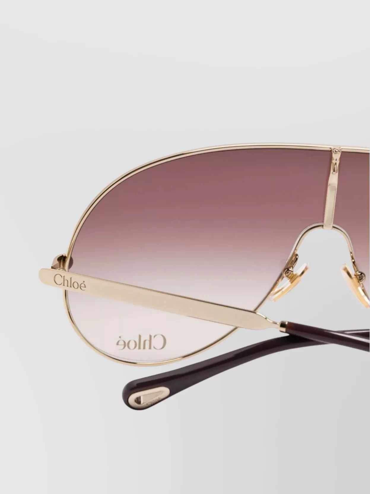 Chloé Rimmed Sunglasses With Gold Frame And Gradient Lenses