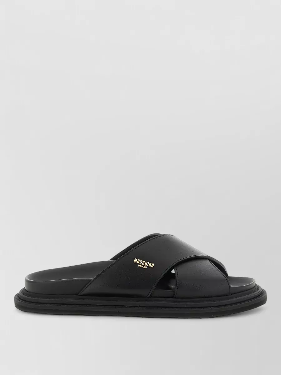 Moschino leather logo-plaque sandals