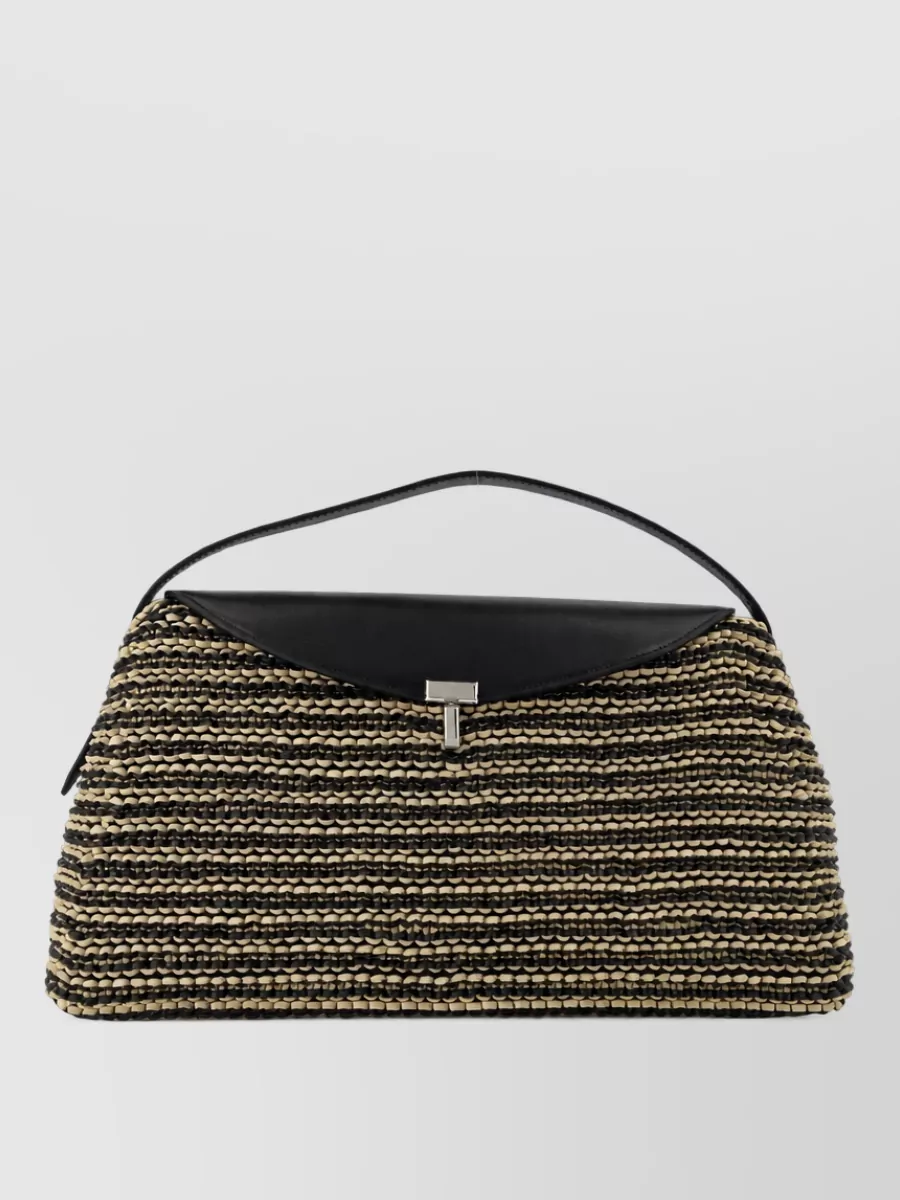 Totême leather clutch bag