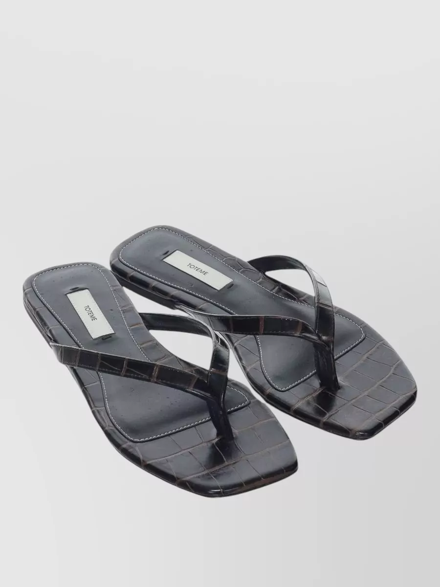 Totême Embossed Leather Flat Thong Sandals