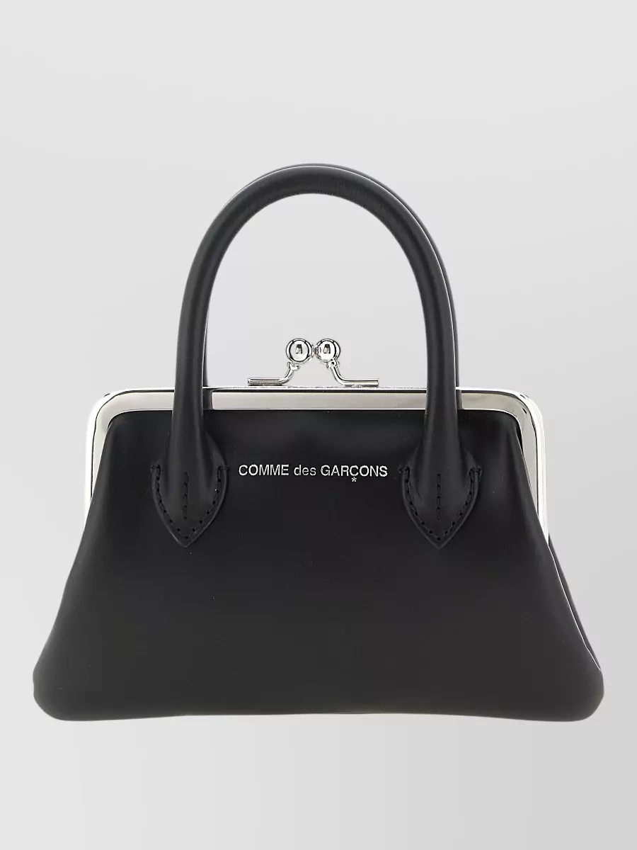 Comme des Garçons leather kiss-lock wallet