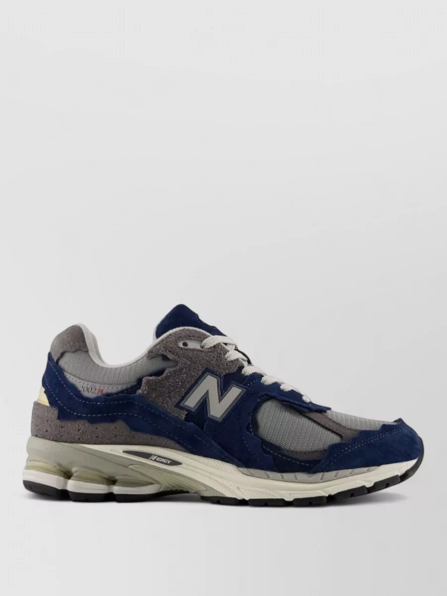 New Balance paneled low-top sneakers