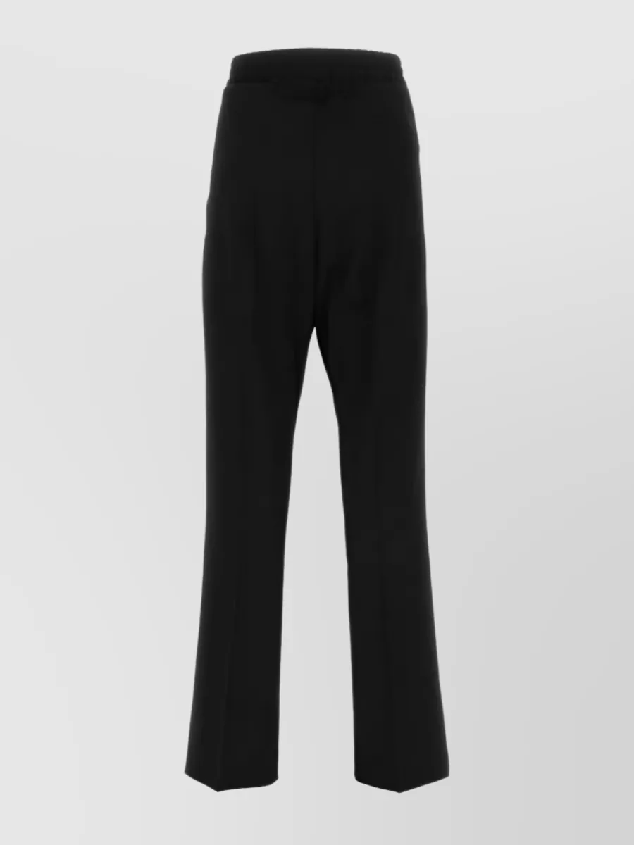 Shop Oamc Tailored Elastic Waist Trousers In Black
