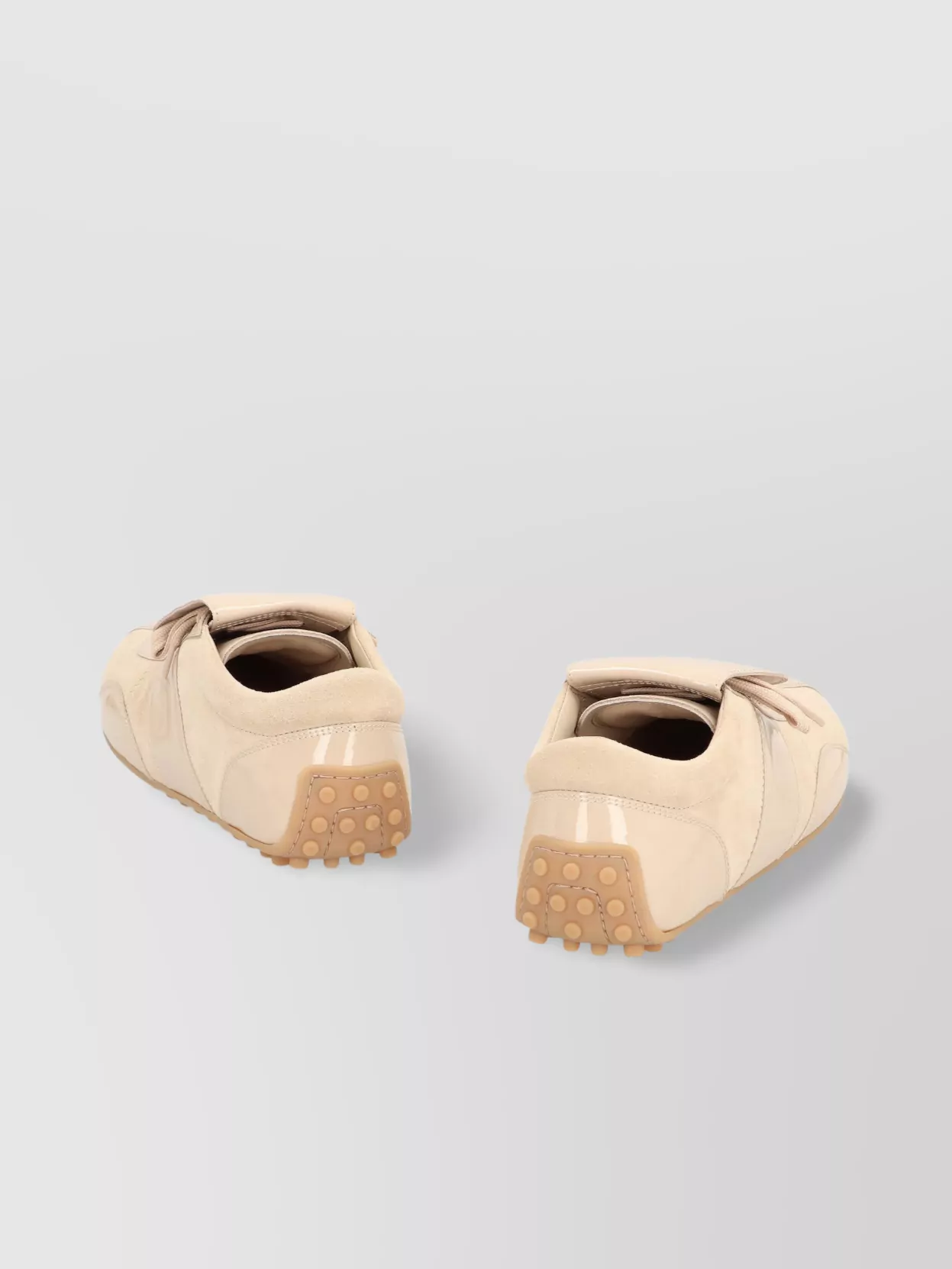 チロル　0527 Tod's Suede sneakers with rubber sole studs | The Fashion Square
