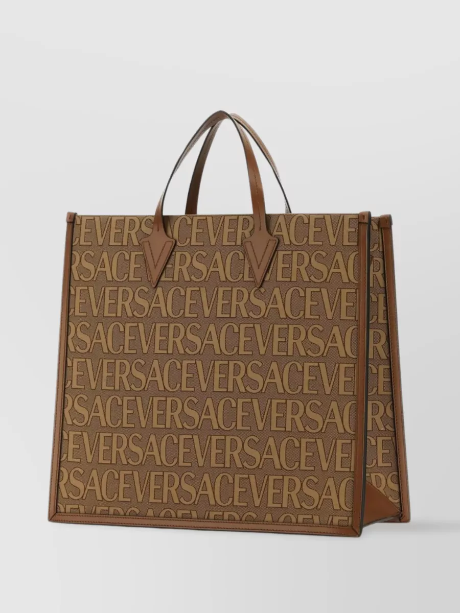 Shop Versace Dual Handle Tote Bag In Brown