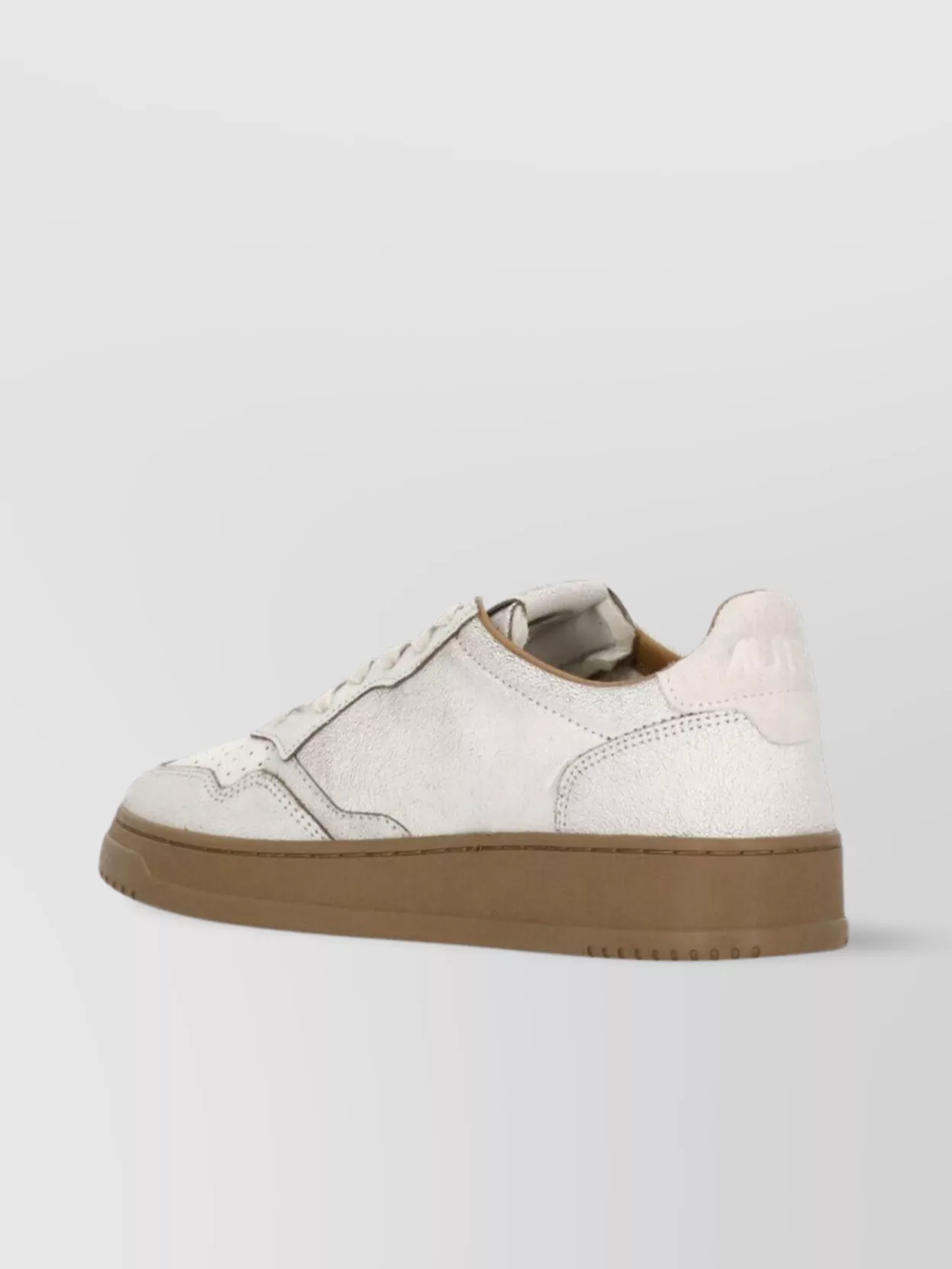 Autry Low Top Leather Sneakers With Perforated Round Toe In White