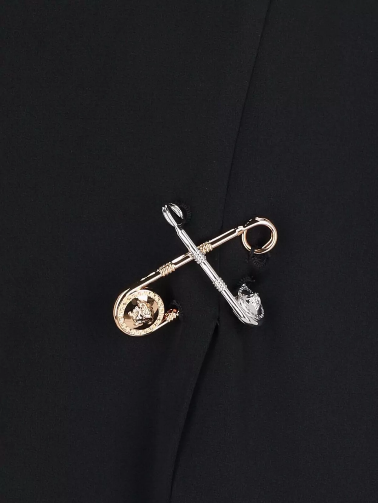 VERSACE KNEE LENGTH AND MIDI SKIRTS WITH DECORATIVE PINS