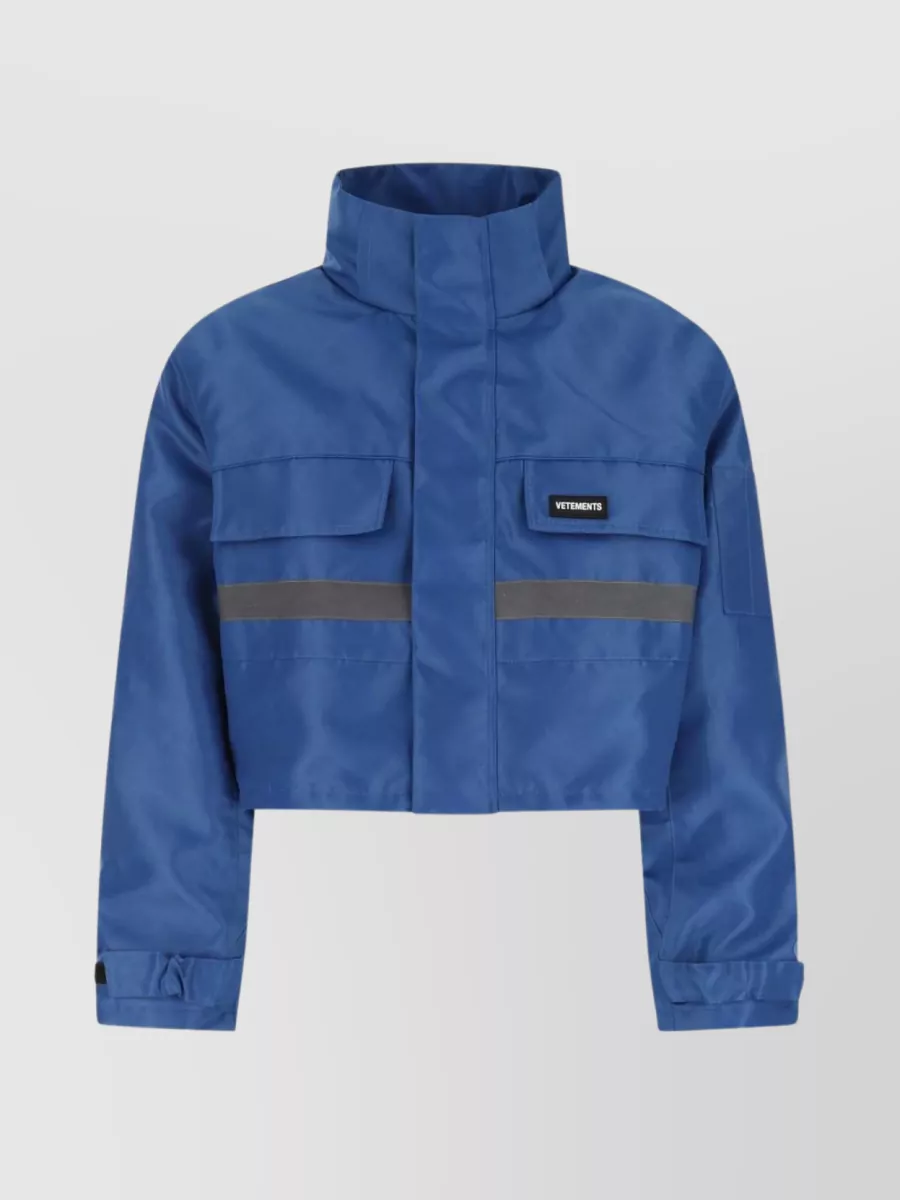 Shop Vetements Short Padded Jacket With High Collar And Reflective Accents In Blue