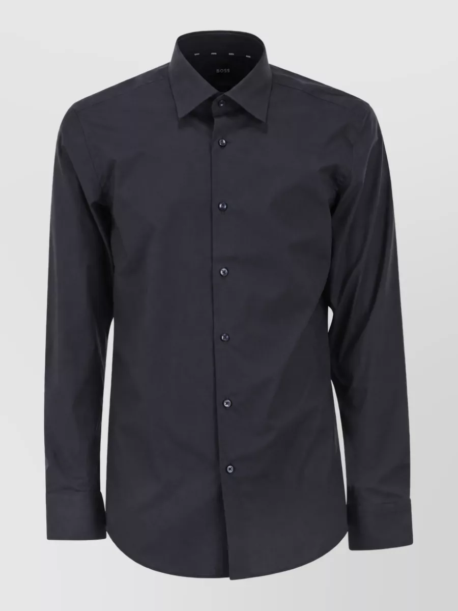 Boss Slim-fit shirt — The deep navy shirt gives a sharper contrast against the ice-fade denim while staying minimalist and FW-appropriate, echoing the quiet luxury mood of the reference styling.