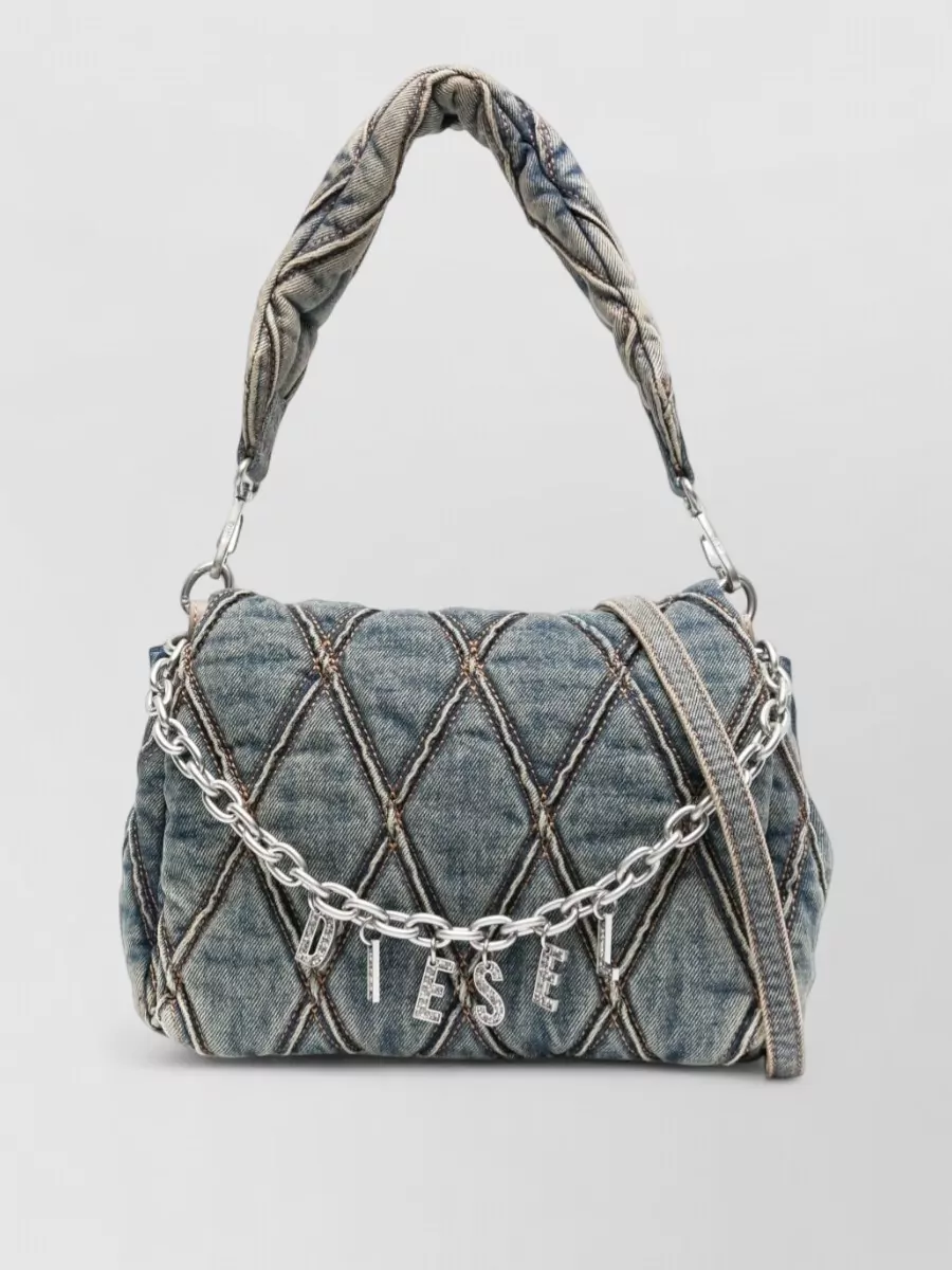 Diesel Denim shoulder bag — The pale ice-blue crystal-logo shoulder bag ties directly into the shorts’ faded wash and adds a concise Y2K hit that matches the playful but off-duty mood.