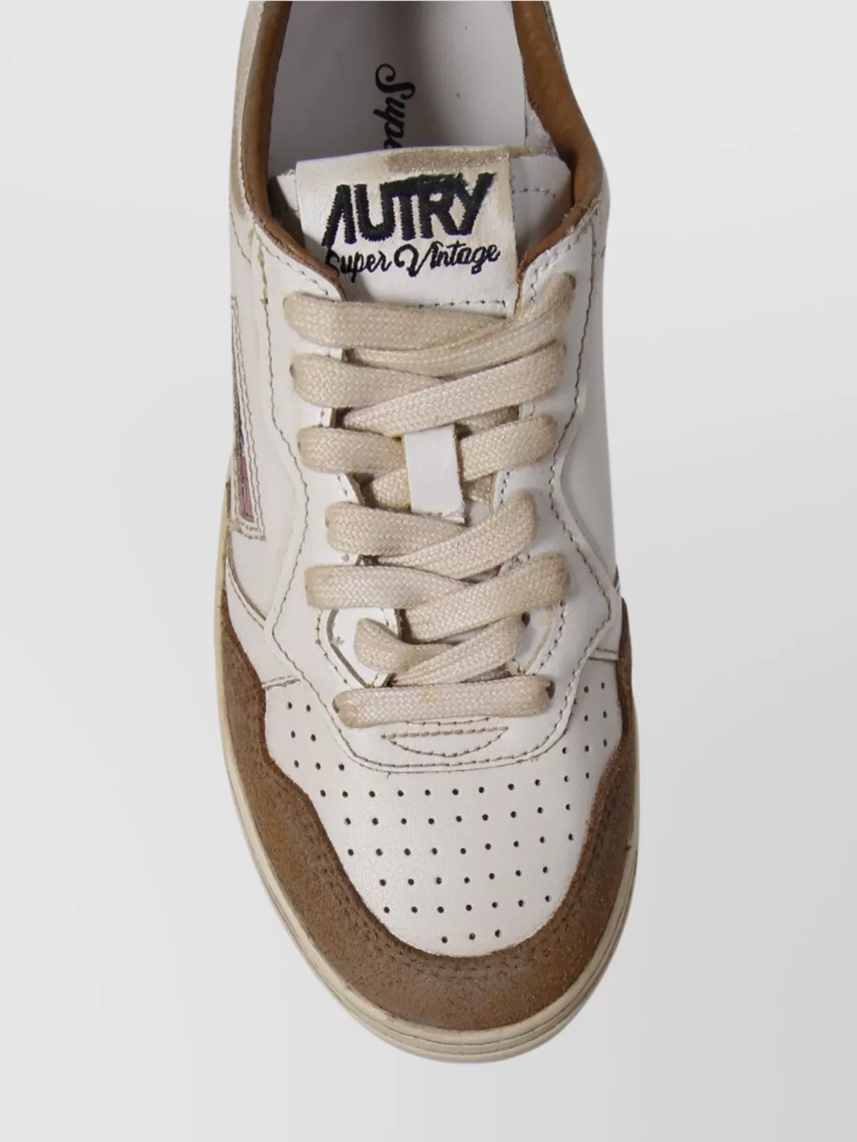 Autry Low Sneaker With Perforated Detailing And Contrast Panel