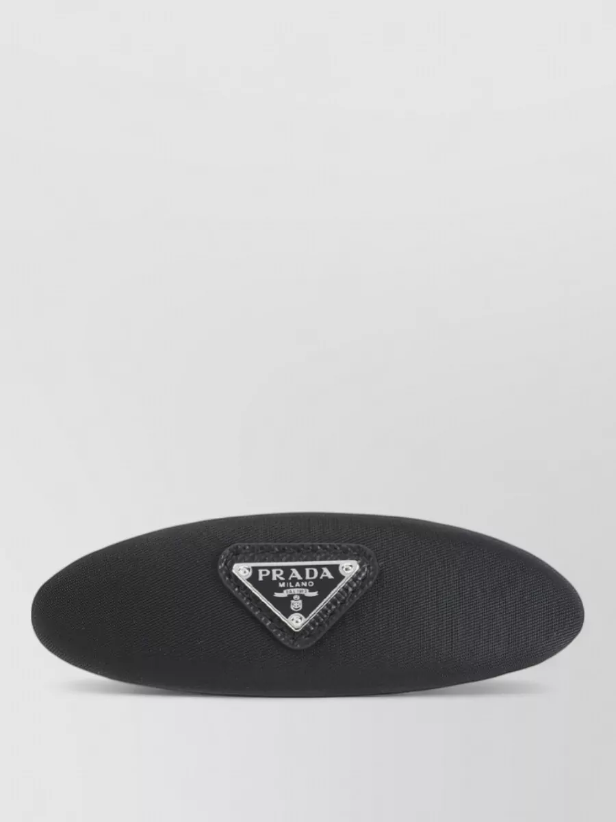 Prada brass hair clip