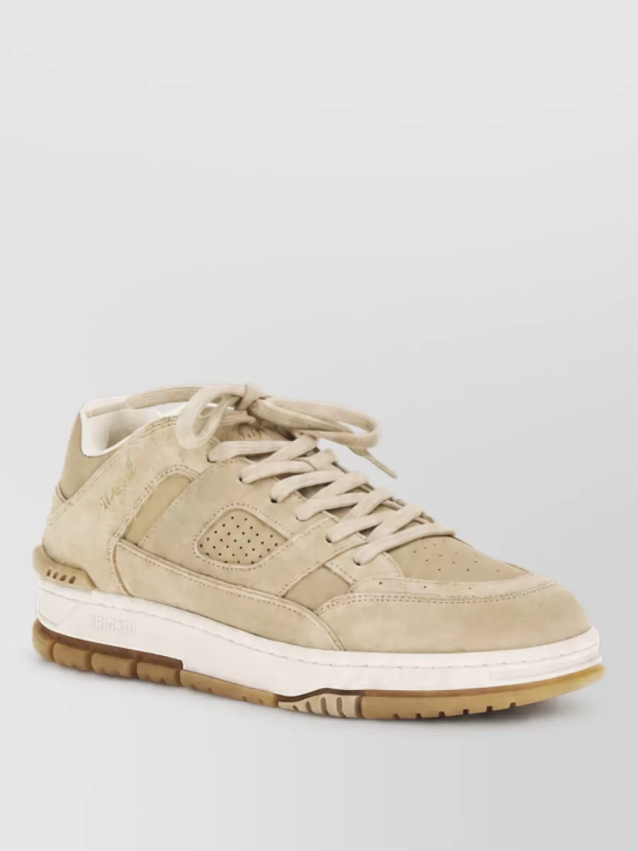 Axel Arigato leather paneled low-top sneakers