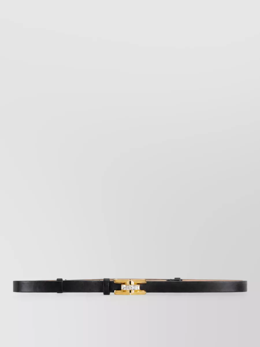 Elisabetta Franchi Leather belt — The Elisabetta Franchi slim black belt with gold and crystal detail can subtly cinch the waist if desired, introducing a refined glint that aligns with the jewelry and evening formality.