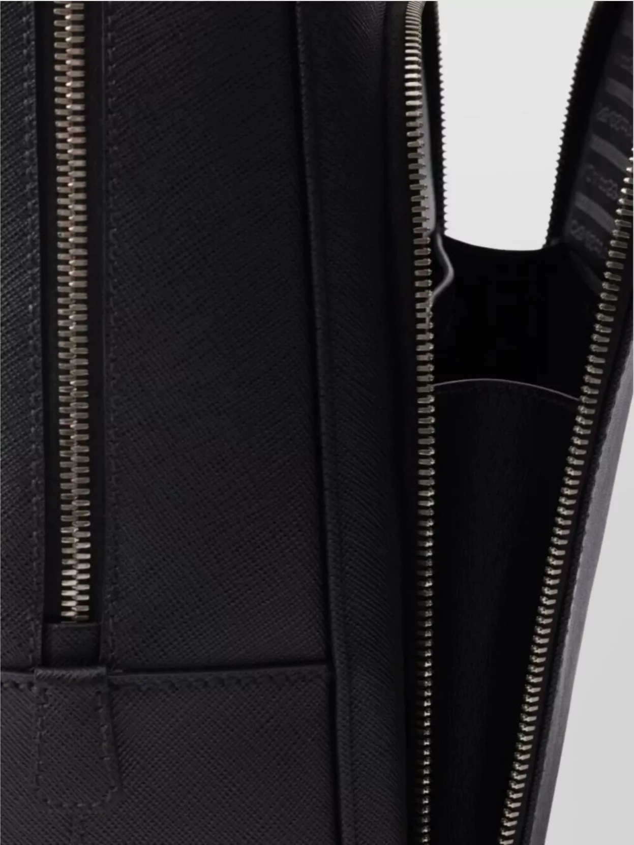 Shop Prada Textured Leather Backpack With Front Zip Pocket