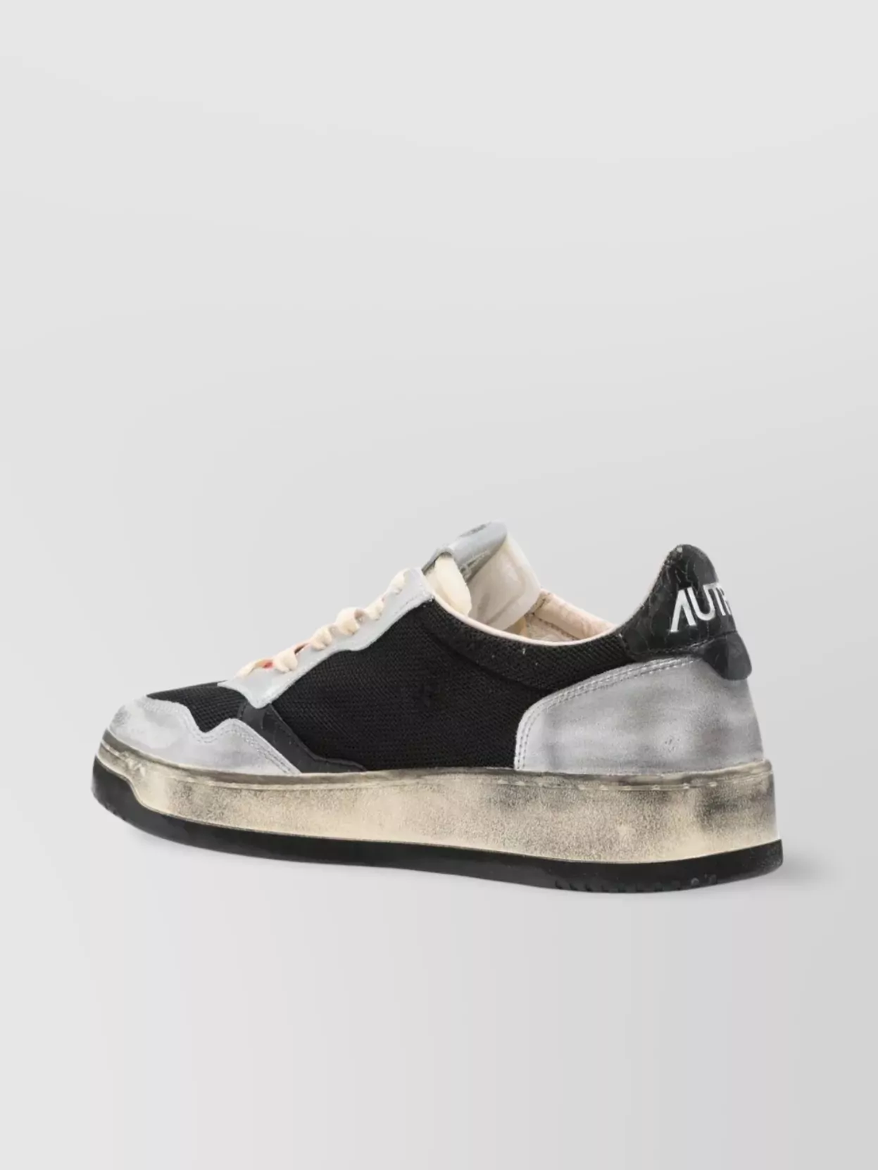 Autry Low Cut Leather Sneakers With Silver Inserts