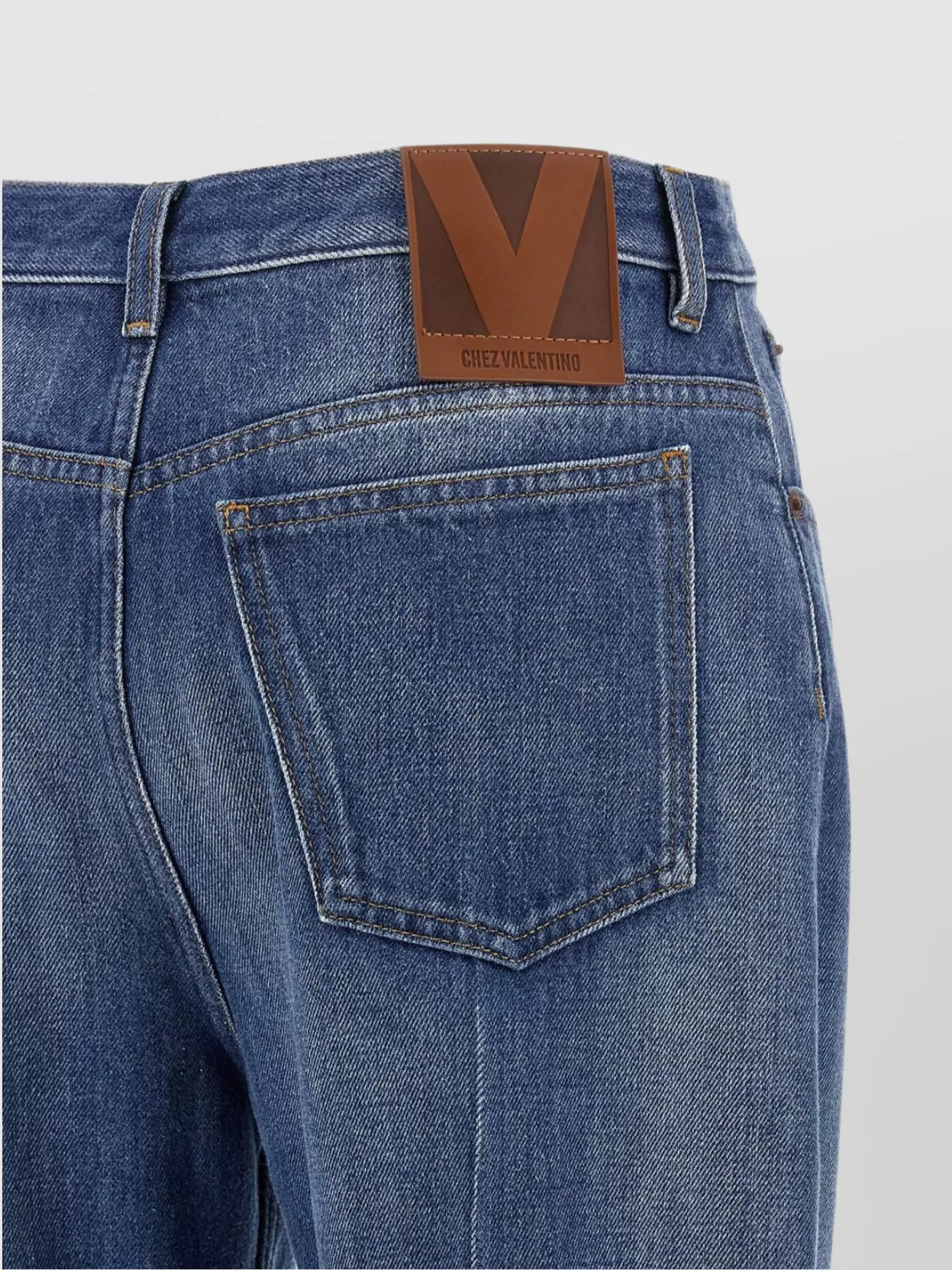 Valentino Garavani Flared Denim Trousers With Belt Loops And Contrast Stitching