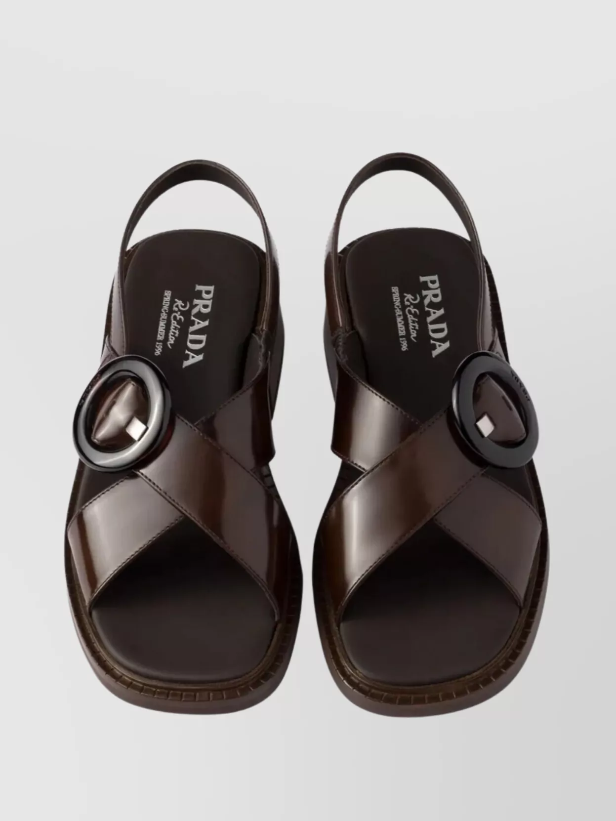 Prada Brushed Leather Crisscross Band Sandals With Plexiglas Buckle