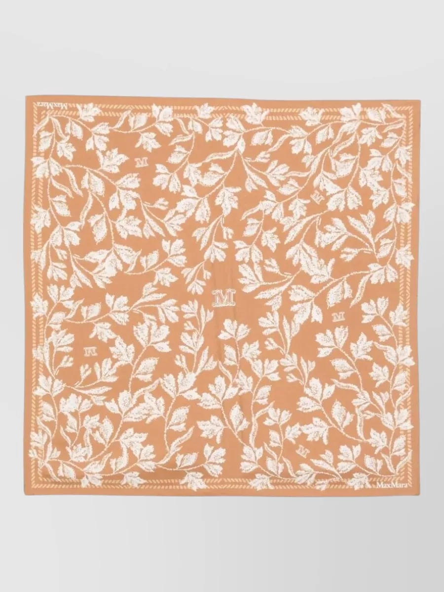 Max Mara Silk printed square scarf — The warm caramel-and-ivory Max Mara scarf can be loosely draped or tied to introduce a soft romantic detail that stays within the sand-toned neutral story.