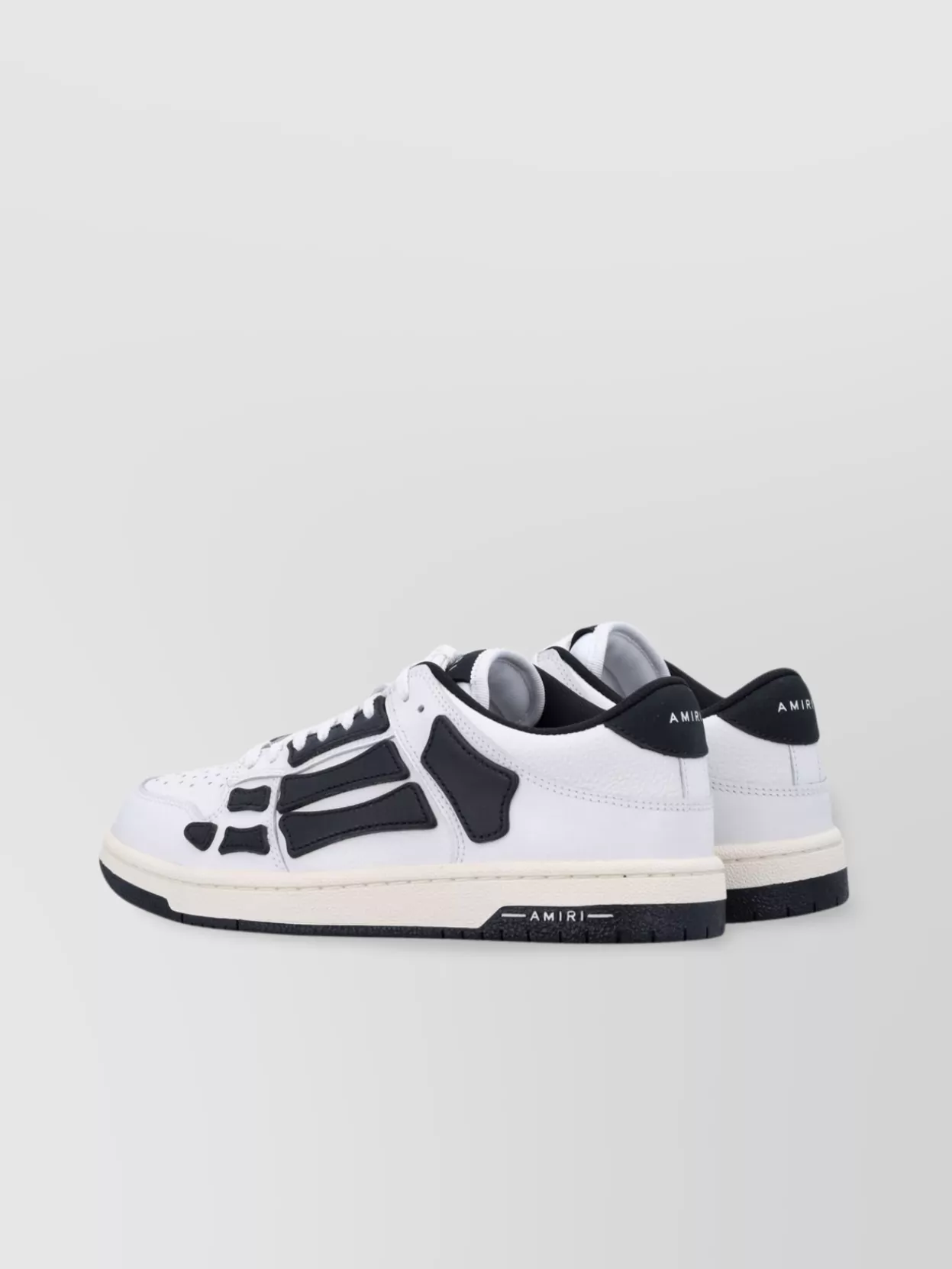 Amiri Skel Top Low Black And White Sneakers With Logo Patch On Thetongue And Contrasting Details On The Si In White