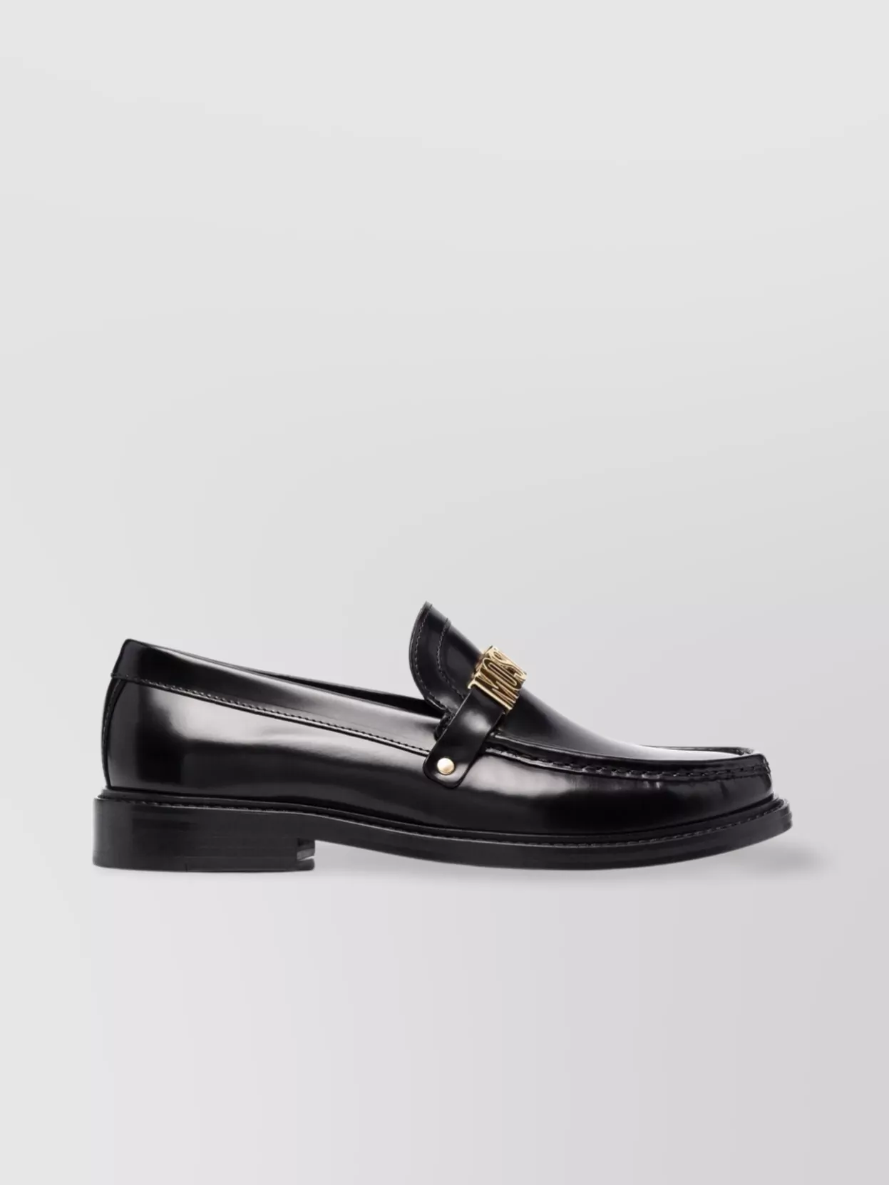 Shop Moschino Refined Almond Toe Loafers In Black