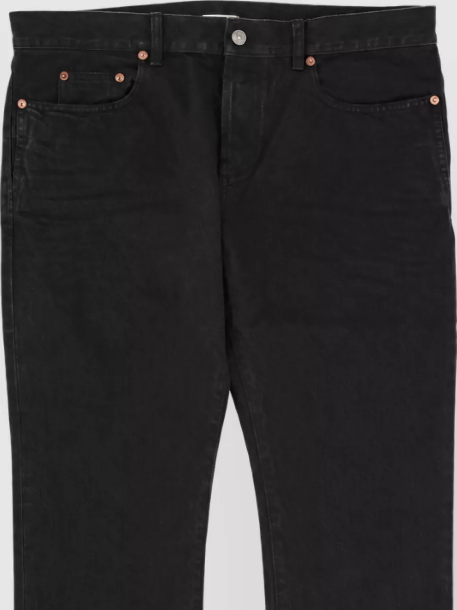 Saint Laurent Slim fit denim jeans straight leg — The washed black straight-leg denim in K gives a clean, mid-rise line that mirrors the tee’s regular cut and grey tone, creating a quiet, rock‑leaning monochrome palette ideal for fall and winter.