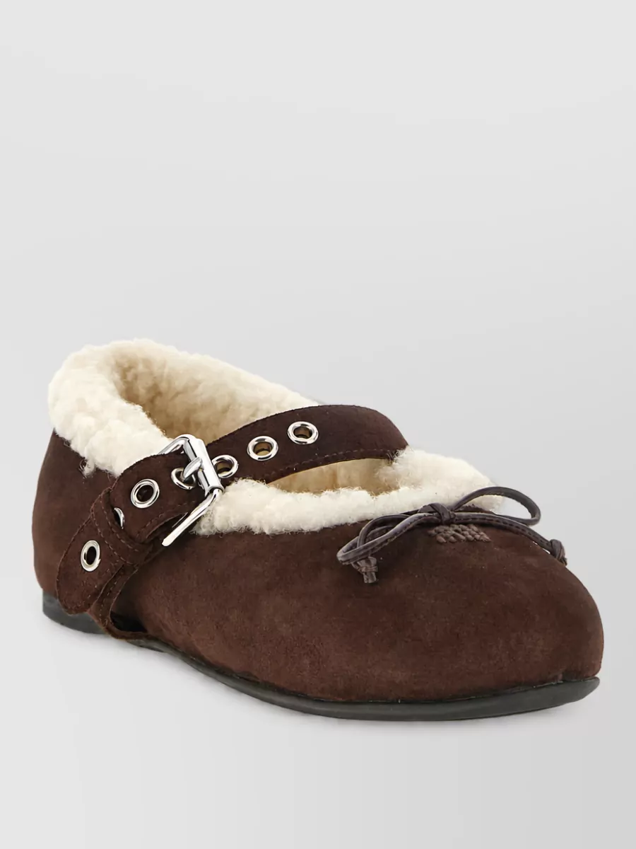Miu Miu sheepskin slippers