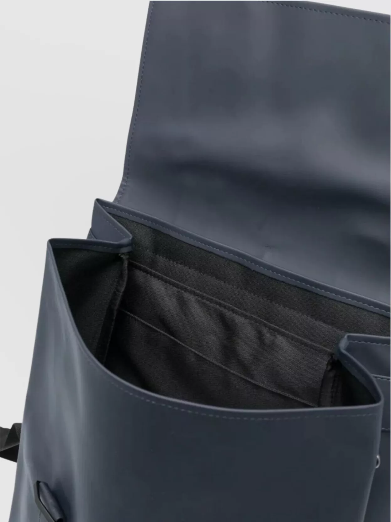 Rains Messenger Bag With Adjustable Straps And Top Handle