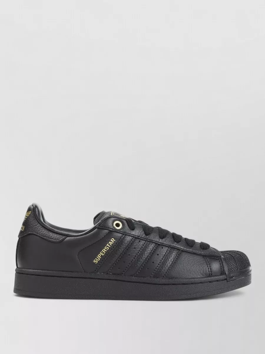Adidas leather low-top sneakers