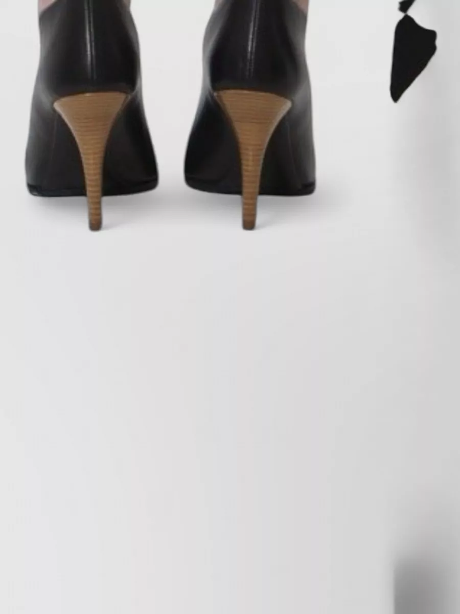 Alaïa Virgin Wool Asymmetric Mid-Rise Mini Skirt