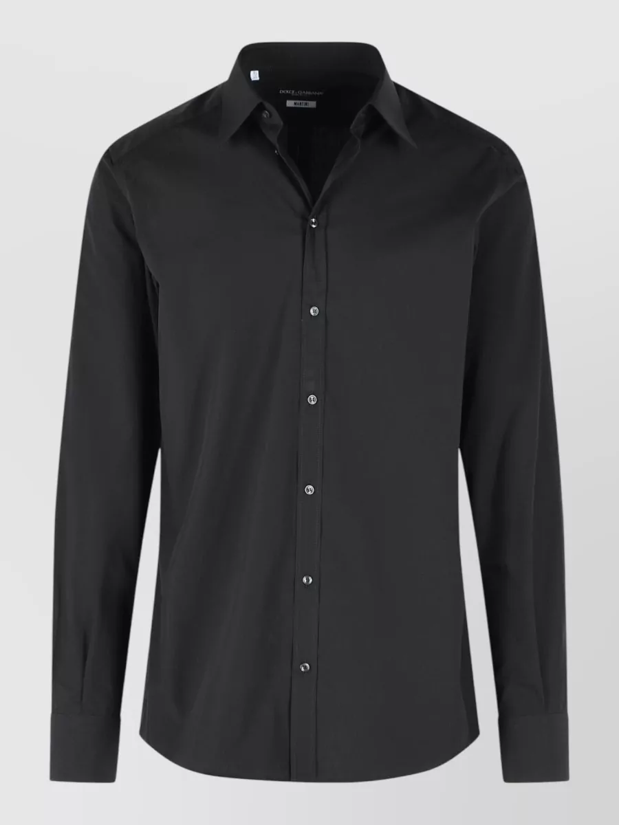 Dolce&Gabbana Cotton shirt — The concealed-placket black shirt keeps the line ultra-clean with the slim black trousers, delivering formal, quiet-luxury evening polish without competing textures or contrast.