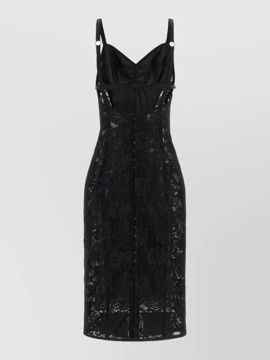 Dolce&Gabbana Corset midi dress — The Dolce&Gabbana black lace midi echoes the lace and pearls of the Jimmy Choo pumps, creating a darkly romantic, body-skimming cocktail ensemble that matches formality and price tier without competing textures on the lower half.