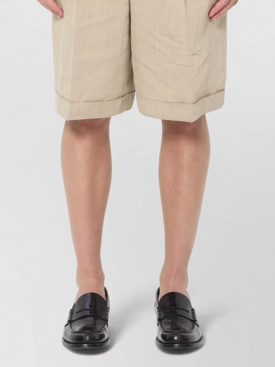 Jacquemus Textured linen mid-rise wide-leg bermuda shorts