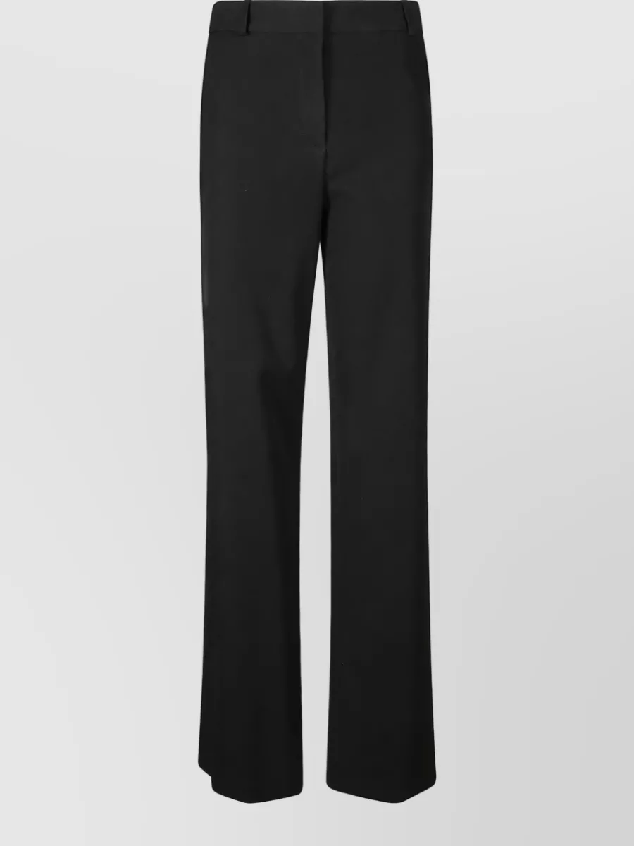 The Row flared trousers
