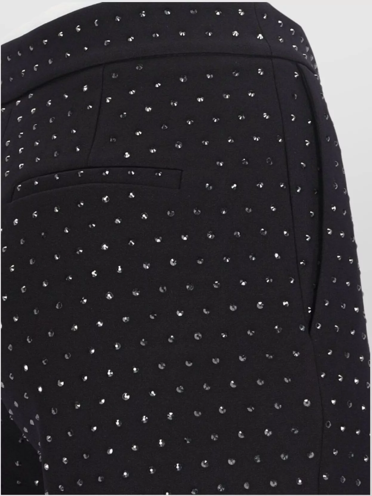 The Andamane Flared High Waist Trousers With Stud Embellishments In Black