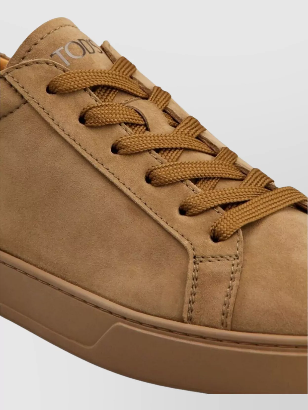 Tod's Low-Top Round Toe Rubber Sole Sneakers