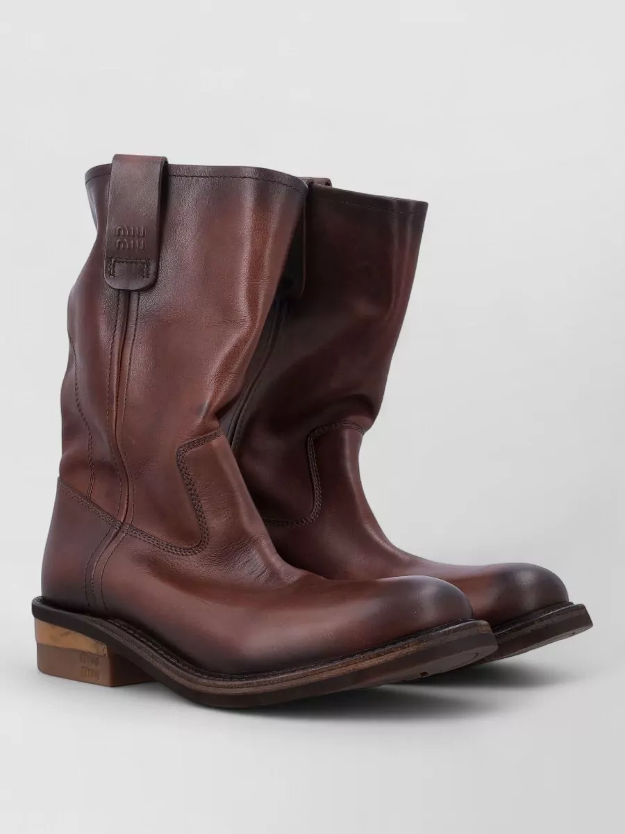 Miu Miu leather slouchy ankle boots