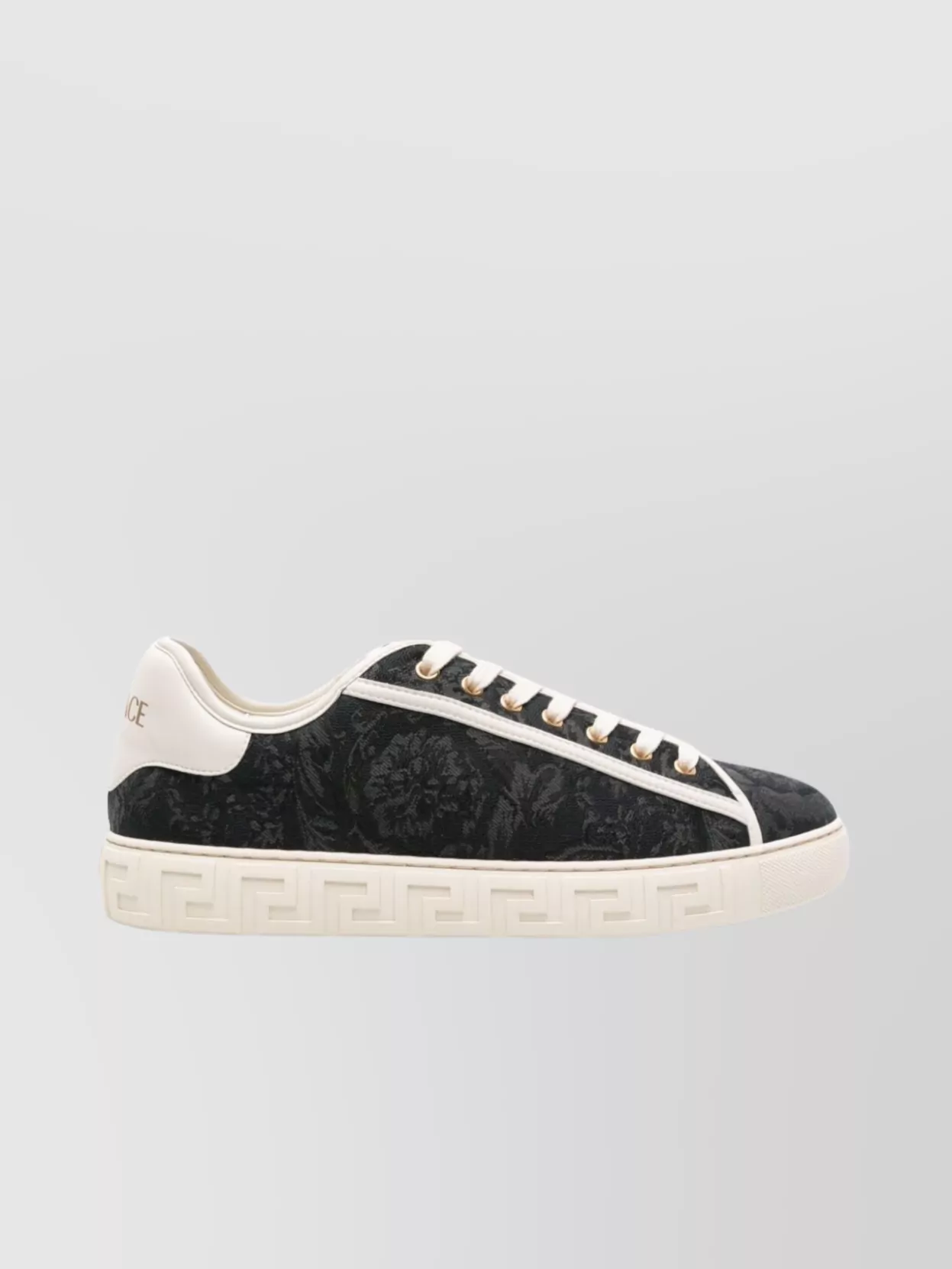 Shop Versace Low Top Sneakers With Signature Embossed Design