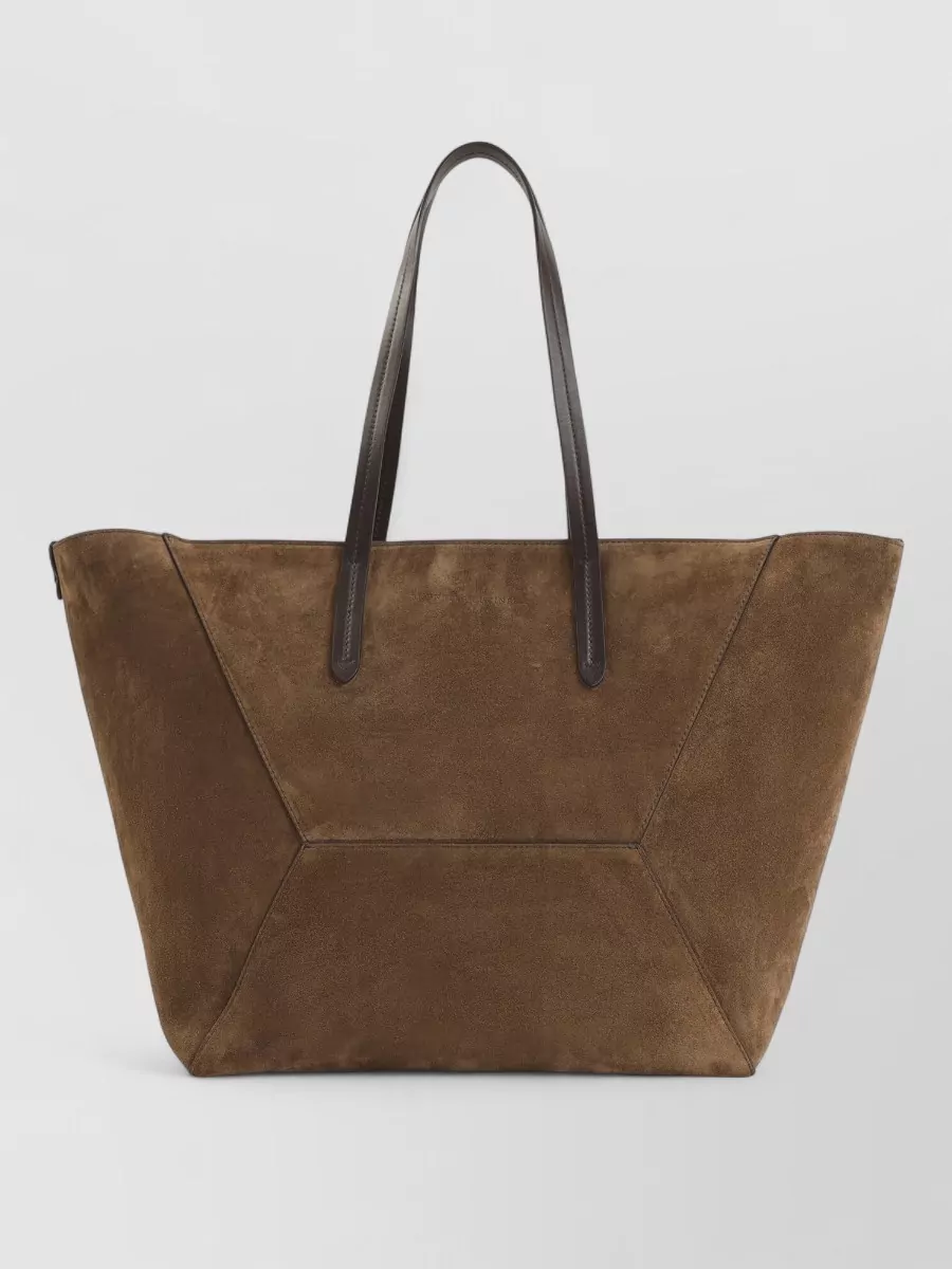 Brunello Cucinelli Duo medium suede leather tote bag — The chestnut Brunello Cucinelli suede tote introduces warm depth and texture that still feels quiet and minimal, grounding the cream and grey with a rich but understated tone.
