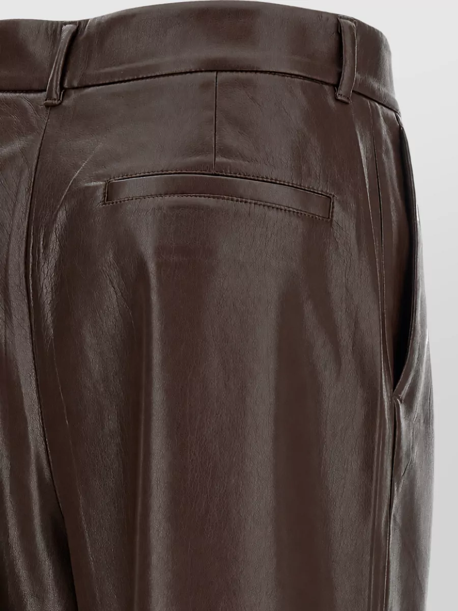 The Andamane Leather-Effect Pleated Flared Trousers