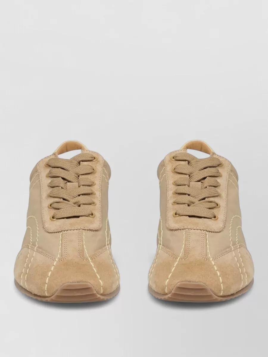 Totême leather lace-up sneakers